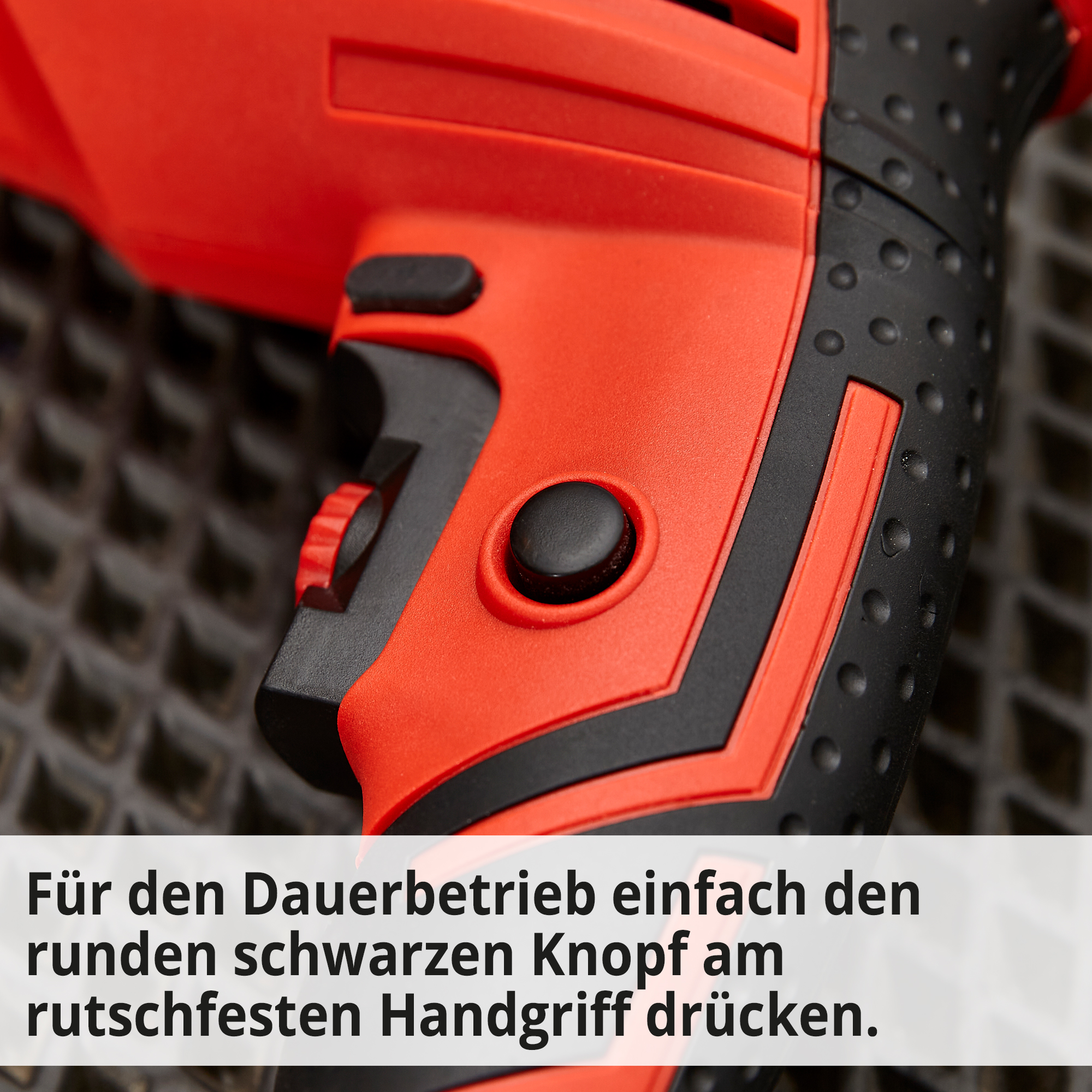 HECHT 1072 Schlag-Bohrmaschine; Für den Dauerbetrieb einfach den runden schwarzen Knopf am rutschfesten Handgriff drücken