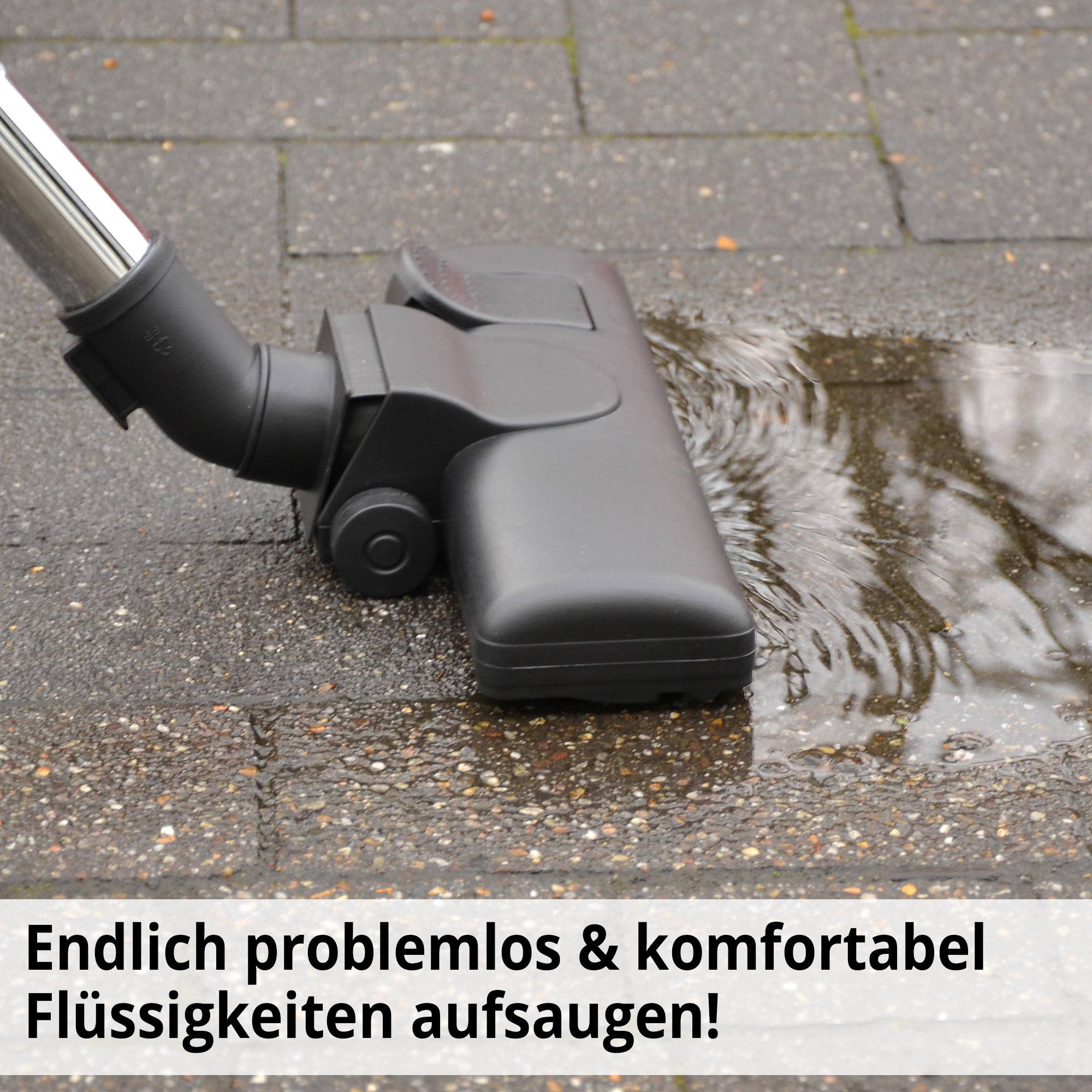 Industriesauger saugt Flüssigkeiten effizient von glatten Böden auf Industriesauger saugt Flüssigkeiten effizient von glatten Böden auf